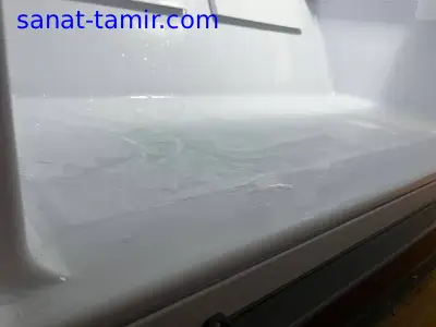چرا کف فریزر یخچال آب جمع میشه